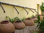 Camagüey. Patio with "tinajones" (large earthenware jars)